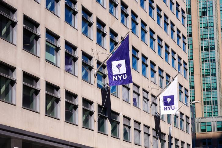 New York University banners hang on 370 Jay St. in Downtown Brooklyn, where NYU has renovated the building to create a new academic center.